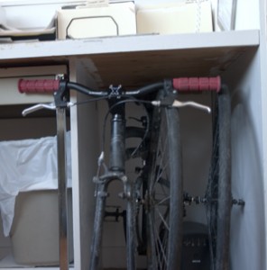 Montague Boston under a desk