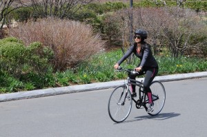 2015 Montague Crosstown folding bike riding by woman