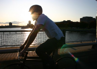 2015 Montague Boston folding bike riding with sunlight