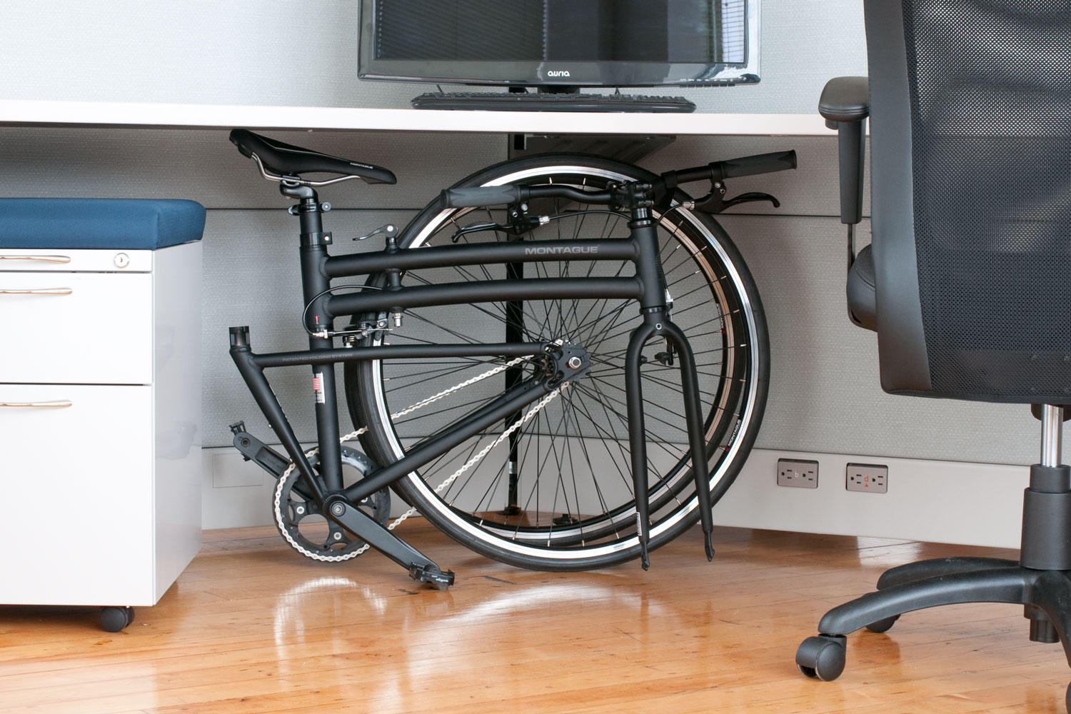 boston-folding-bike-under-desk-in-office