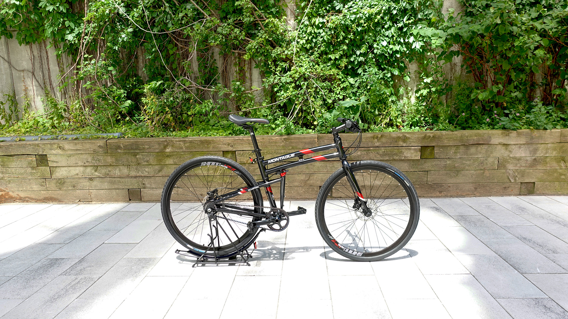 allston parked uncropped small Montague Allston Folding Road Bike with Belt Drive, Internal Gear Hub, Disc Brakes