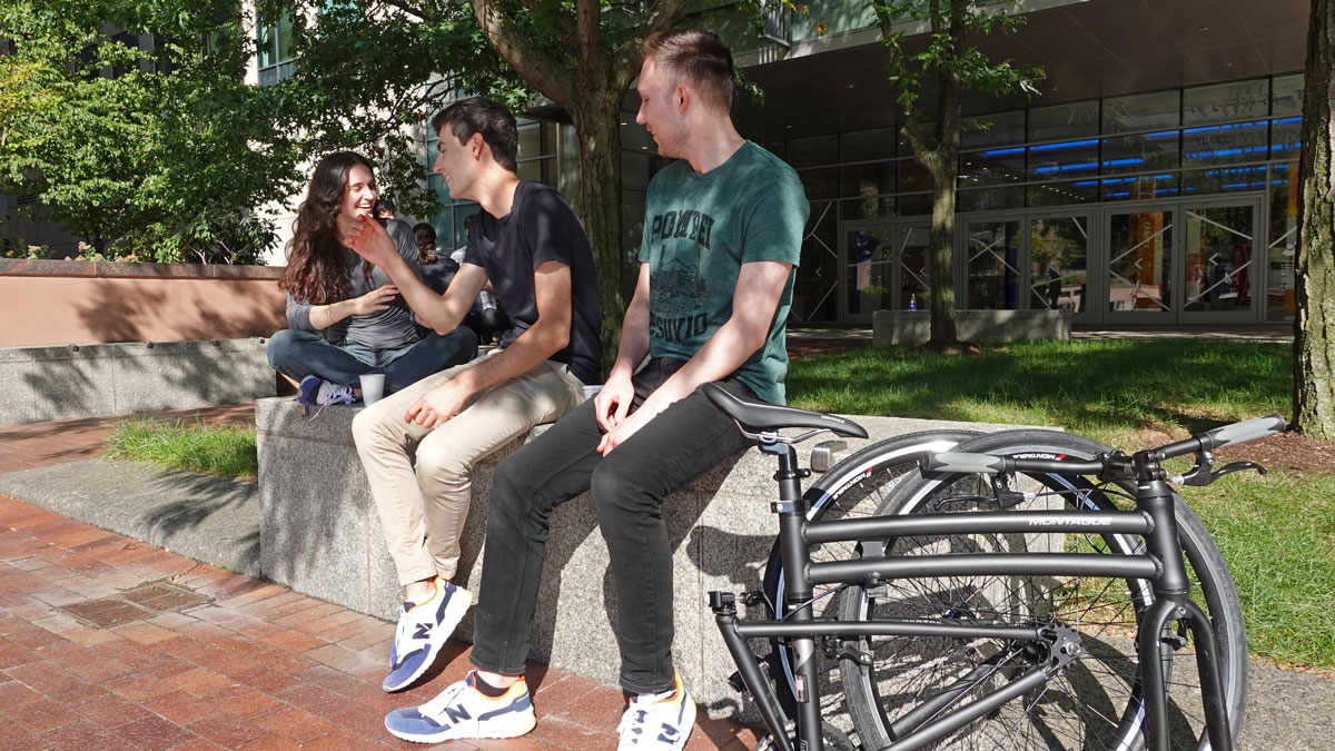 Montague Boston folding pavement bike with college students